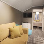 VillaVuokatti - Villa Inca Gold Sofa